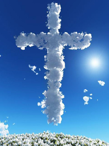 Photo of a cross in the clouds, with more than a little help from Photoshop