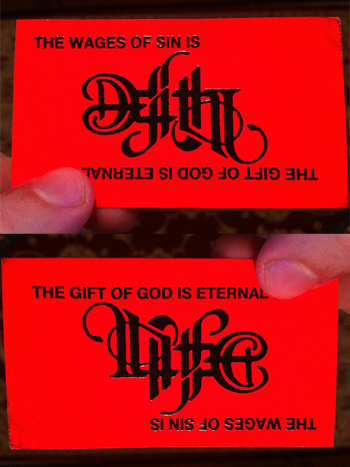 Photo of a business card with The Wages of Sin printed on it